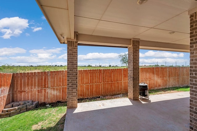 view of patio / terrace with fence