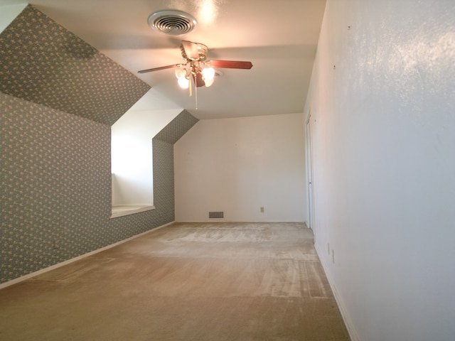 2809 E 17th St, Odessa, TX 79761 - bonus room with carpet flooring, ceiling fan, wallpapered walls, and lofted ceiling