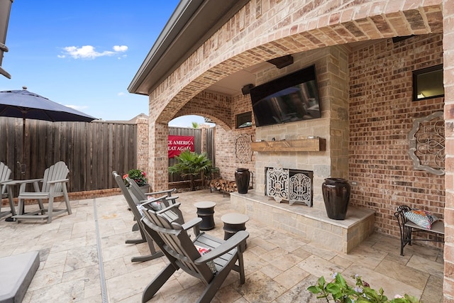 4309 Greenville Dr, Midland, TX 79705 - view of patio featuring an outdoor stone fireplace