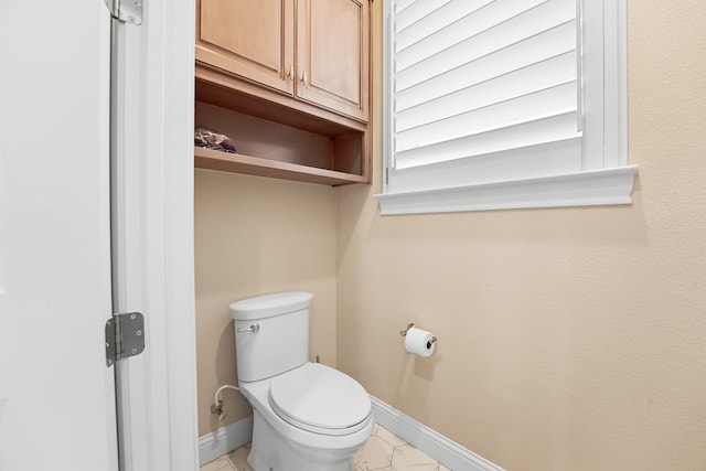 4309 Greenville Dr, Midland, TX 79705 - bathroom with baseboards and toilet