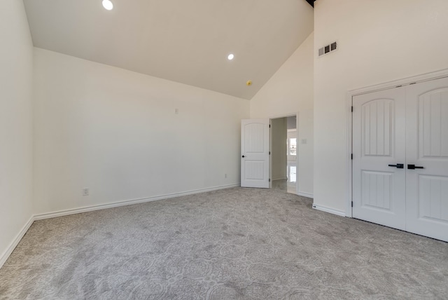 12045 W Palomino Ave, Odessa, TX 79764 - unfurnished bedroom with high vaulted ceiling, carpet flooring, recessed lighting, and a closet