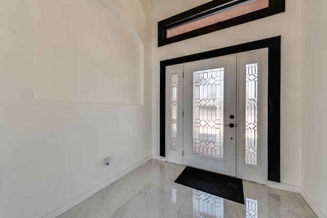 12045 W Palomino Ave, Odessa, TX 79764 - entryway with baseboards and light marble finish flooring