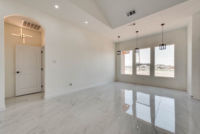 12045 W Palomino Ave, Odessa, TX 79764 - spare room featuring arched walkways, light marble finish flooring, recessed lighting, and high vaulted ceiling