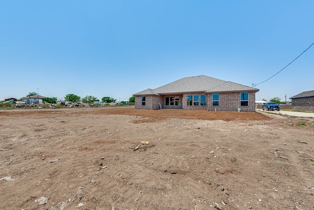 12045 W Palomino Ave, Odessa, TX 79764 - back of house with brick siding
