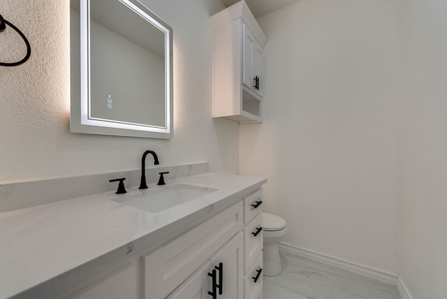 12045 W Palomino Ave, Odessa, TX 79764 - bathroom featuring vanity and marble finish floors