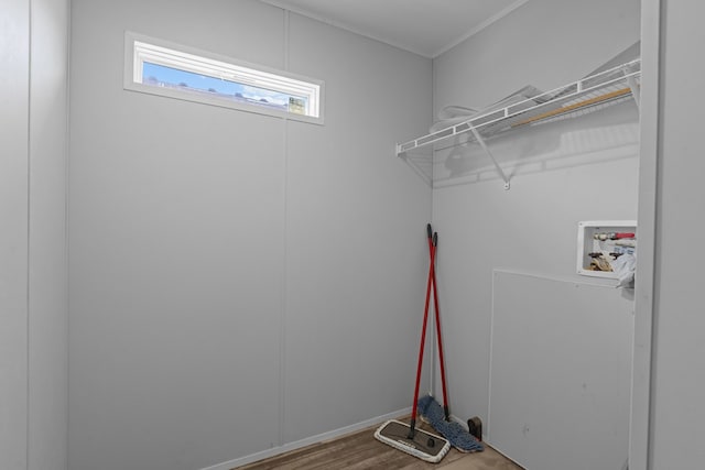 5714 Ector Ave, Odessa, TX 79714 - laundry room with hookup for a washing machine and wood finished floors