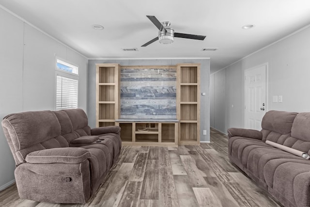 5714 Ector Ave, Odessa, TX 79714 - living room with wood finished floors, ceiling fan, and crown molding