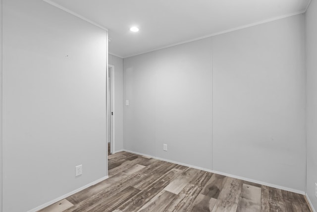 5714 Ector Ave, Odessa, TX 79714 - unfurnished room featuring wood finished floors, recessed lighting, and ornamental molding