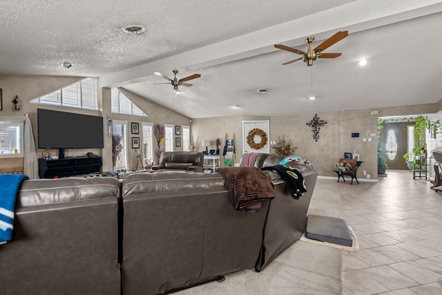 5714 Ector Ave, Odessa, TX 79714 - living room featuring a ceiling fan, light tile patterned flooring, and a textured ceiling
