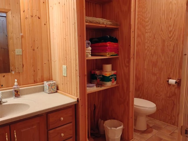 508 Squaw Valley Trl, Fort Davis, TX 79734 - bathroom featuring vanity and wood walls