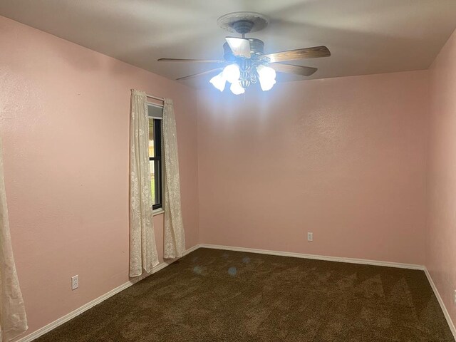 906 S Franklin Ave, Monahans, TX 79756 - carpeted spare room with a ceiling fan and baseboards