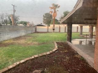 906 S Franklin Ave, Monahans, TX 79756 - view of yard featuring a patio