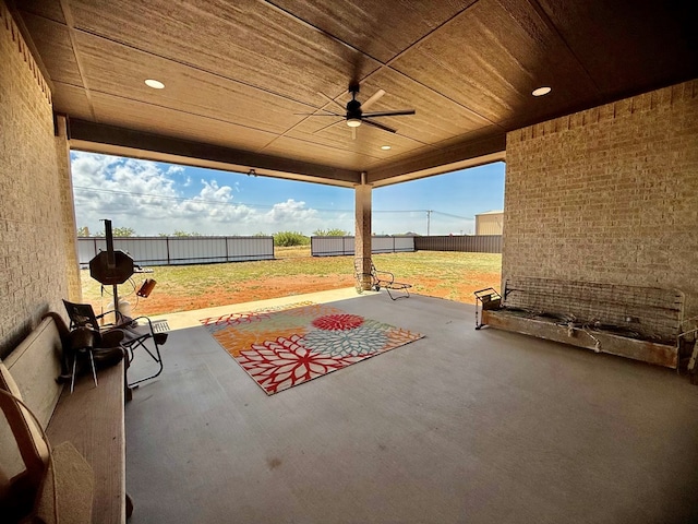 view of patio / terrace with a ceiling fan and a fenced backyard