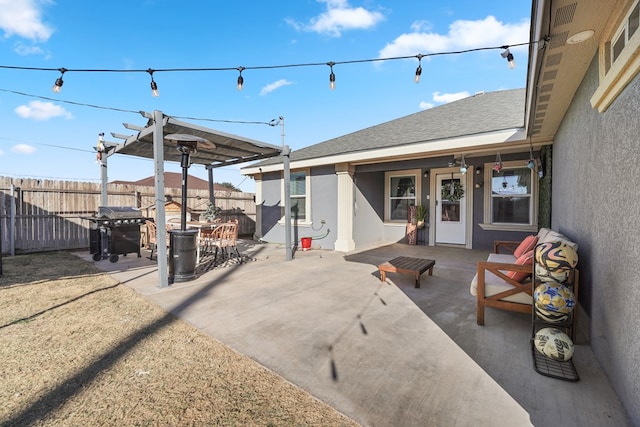 view of patio with a pergola and grilling area