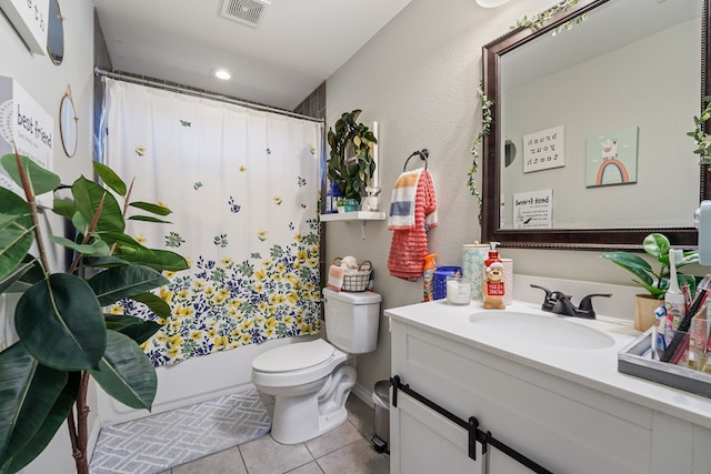 full bathroom featuring toilet, shower / tub combo, vanity, and tile patterned floors