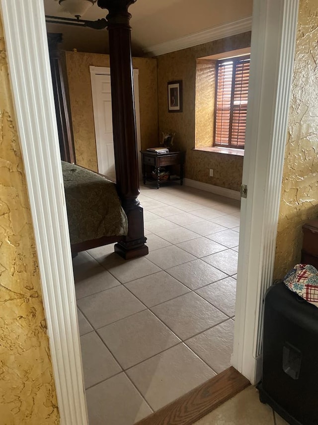 3934 N Bucknell Ave, Odessa, TX 79764 - bedroom featuring ornate columns, light tile patterned floors, crown molding, and baseboards