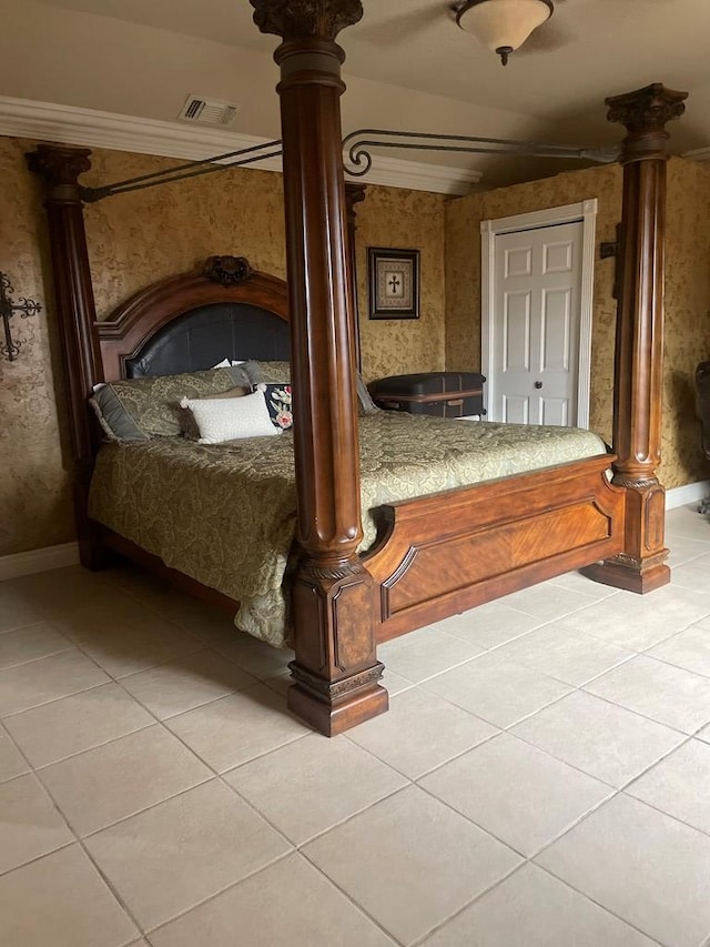 3934 N Bucknell Ave, Odessa, TX 79764 - bedroom featuring wallpapered walls, ornate columns, light tile patterned flooring, baseboards, and ornamental molding