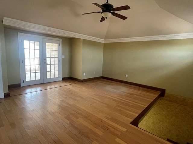 3934 N Bucknell Ave, Odessa, TX 79764 - unfurnished room featuring vaulted ceiling, french doors, wood finished floors, ceiling fan, and baseboards