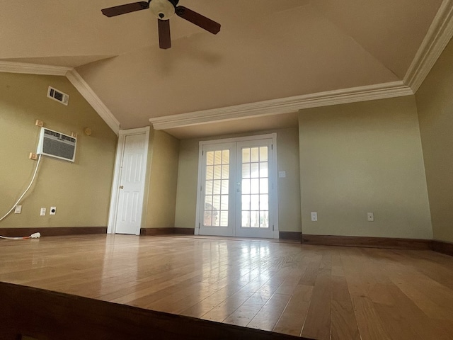 3934 N Bucknell Ave, Odessa, TX 79764 - unfurnished room featuring vaulted ceiling, wood finished floors, a ceiling fan, ornamental molding, and baseboards