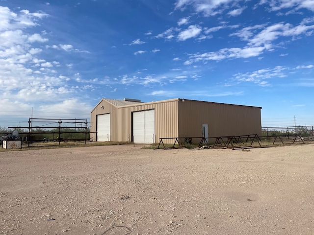 3934 N Bucknell Ave, Odessa, TX 79764 - view of outdoor structure featuring fence and an outbuilding
