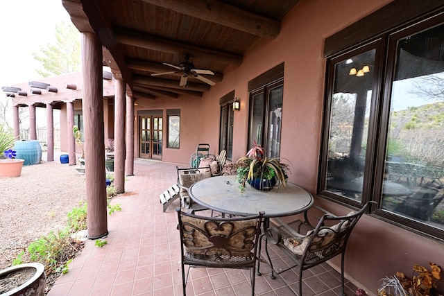 view of patio featuring ceiling fan