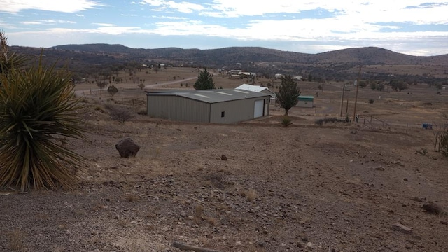 property view of mountains with a rural view