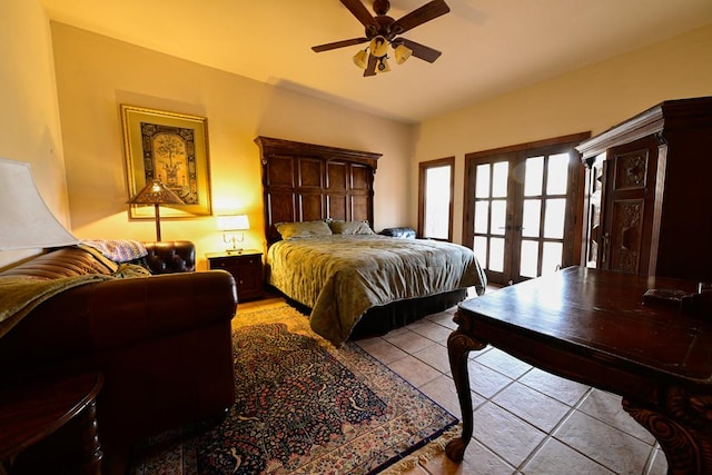 bedroom with ceiling fan and french doors