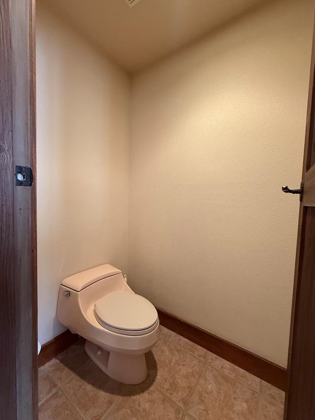 bathroom featuring toilet