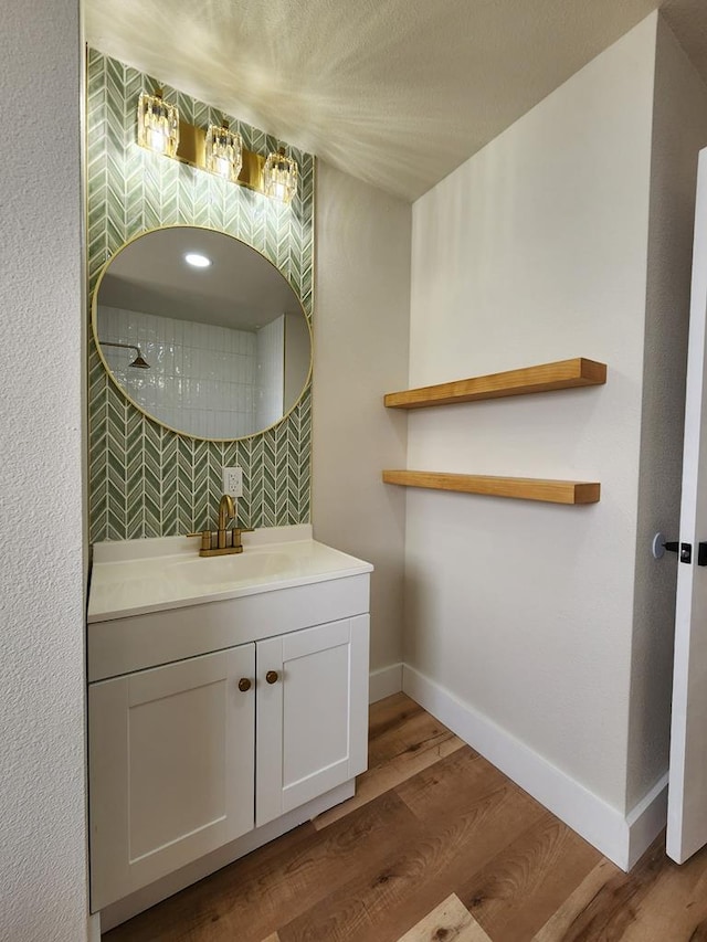 2500 Roper St, Odessa, TX 79761 - bathroom featuring vanity and wood finished floors