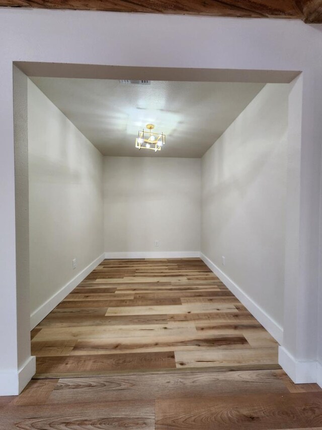 2500 Roper St, Odessa, TX 79761 - empty room featuring wood finished floors and baseboards