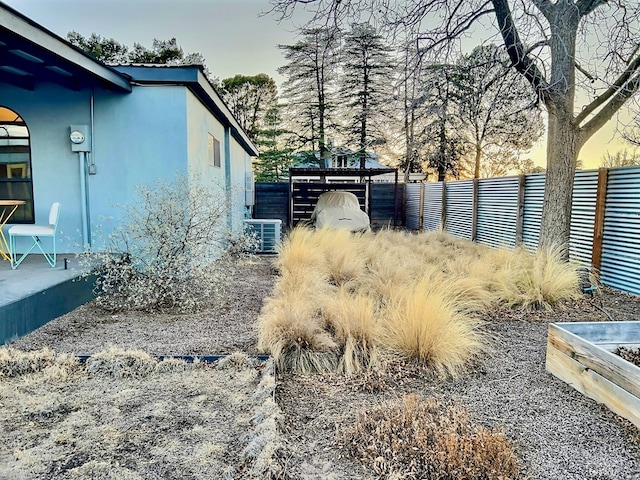 404 N Plateau St, Marfa, TX 79843 - view of yard featuring cooling unit and fence