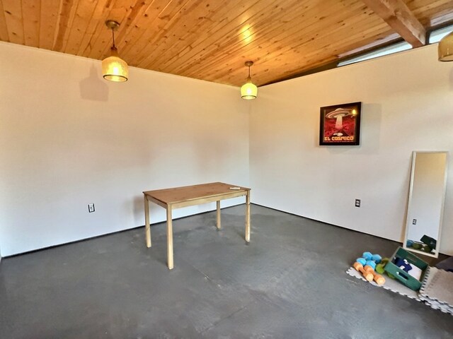 404 N Plateau St, Marfa, TX 79843 - unfurnished dining area with wooden ceiling and concrete floors