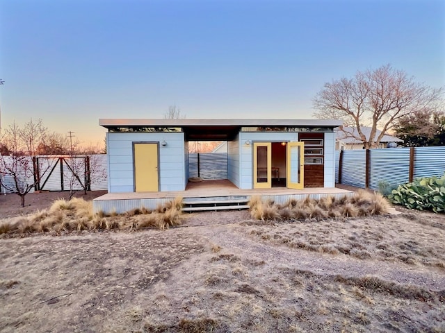 404 N Plateau St, Marfa, TX 79843 - back of house featuring fence and a deck
