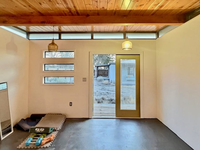 404 N Plateau St, Marfa, TX 79843 - entryway with beamed ceiling, finished concrete flooring, and wood ceiling
