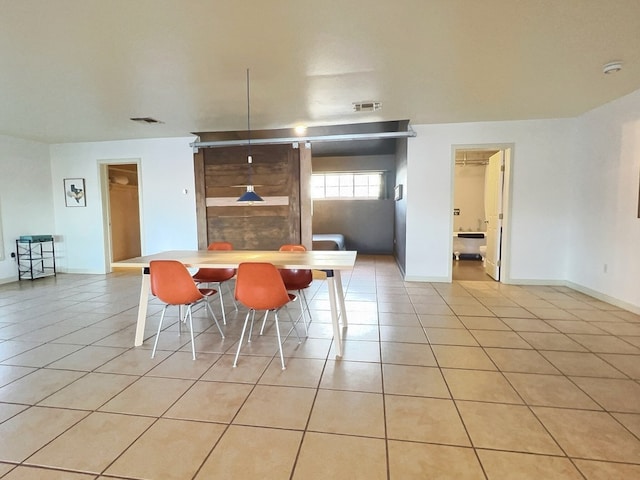 404 N Plateau St, Marfa, TX 79843 - dining space featuring light tile patterned floors and baseboards