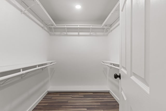 622 W Hillmont Rd, Odessa, TX 79764 - spacious closet with dark wood-style floors