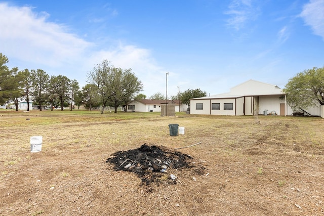 622 W Hillmont Rd, Odessa, TX 79764 - view of yard featuring a fire pit