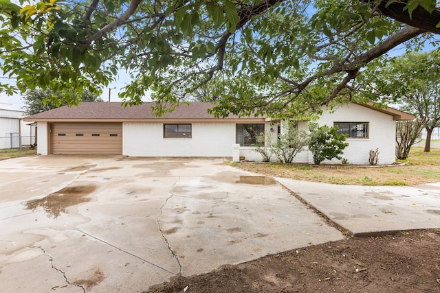 622 W Hillmont Rd, Odessa, TX 79764 - ranch-style home with brick siding, driveway, and an attached garage