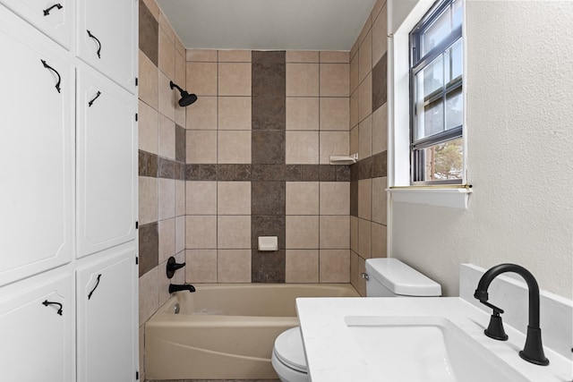 622 W Hillmont Rd, Odessa, TX 79764 - full bath featuring shower / bathtub combination, a textured wall, and vanity
