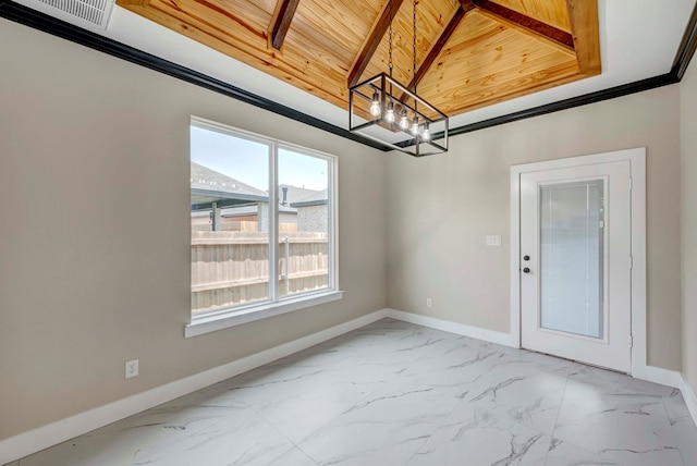 8634 Luz Dr, Odessa, TX 79765 - unfurnished room featuring light marble finish floors, a chandelier, and baseboards