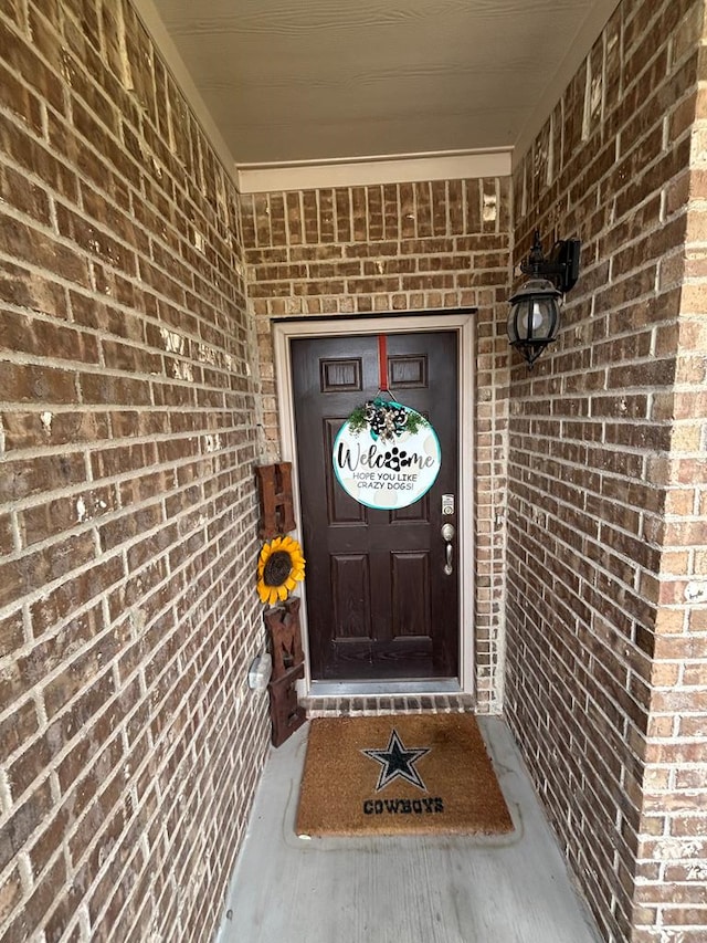 6912 Boss Rnch, Odessa, TX 79765 - property entrance with brick siding