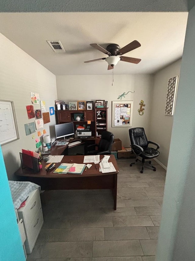 6912 Boss Rnch, Odessa, TX 79765 - office area with a ceiling fan and wood finished floors