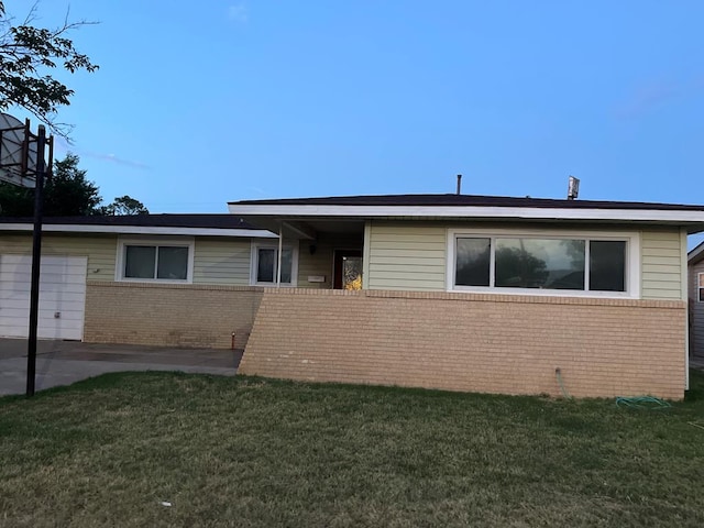 1412 Crescent Dr, Odessa, TX 79761 - single story home with brick siding and a front lawn