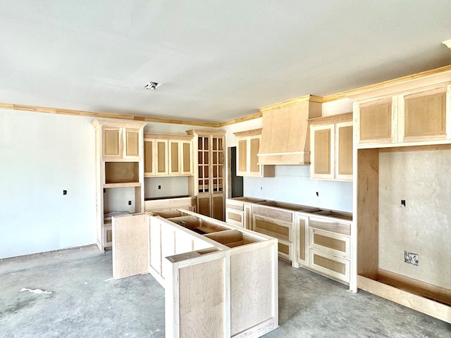 44 La Fauna Dr, Odessa, TX 79765 - kitchen with a center island and unfinished concrete flooring