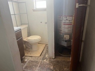 1302 S Texas Ave, Odessa, TX 79761 - bathroom with water heater and vanity
