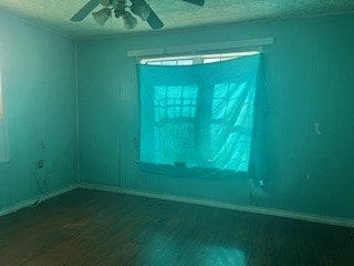 1302 S Texas Ave, Odessa, TX 79761 - empty room with ceiling fan and wood finished floors