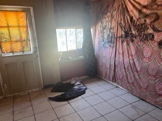 1302 S Texas Ave, Odessa, TX 79761 - view of tiled spare room