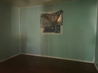 1302 S Texas Ave, Odessa, TX 79761 - empty room with baseboards