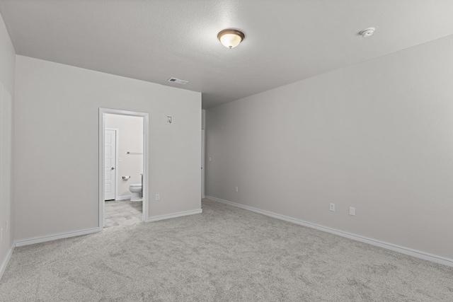 2227 W 3rd St, Odessa, TX 79763 - spare room with carpet floors and baseboards