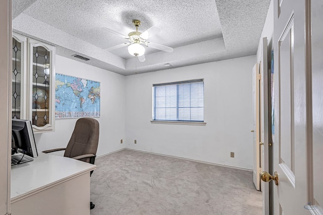 6415 San Mateo Ln, Odessa, TX 79762 - unfurnished office with a textured ceiling, carpet, a raised ceiling, and a ceiling fan